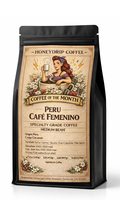 Coffee bag with a label on a white background with our strong women-inspired coffee of the month for womans history month.